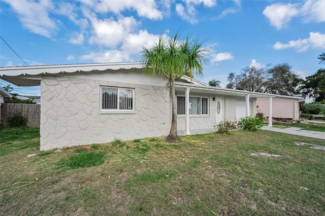 front view of house with a yard