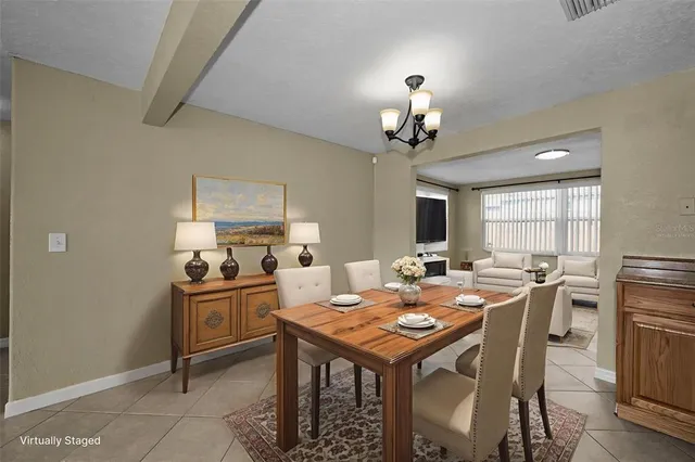 a view of a dining room with furniture