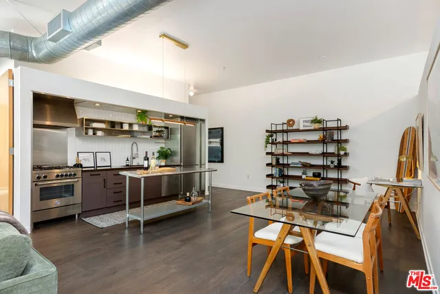 a view of a kitchen with appliances and cabinets