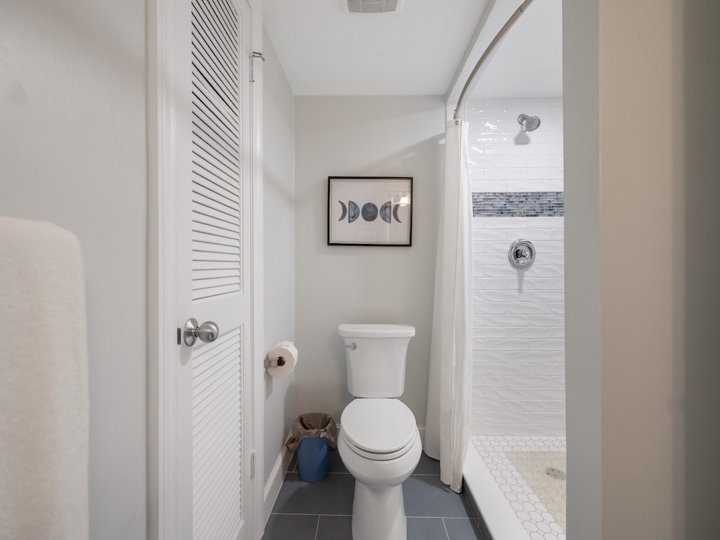 1155 Reef Road, Unit B7 Vero Beach, FL 32963 - Photo 19 of 31 a bathroom with a toilet and a shower