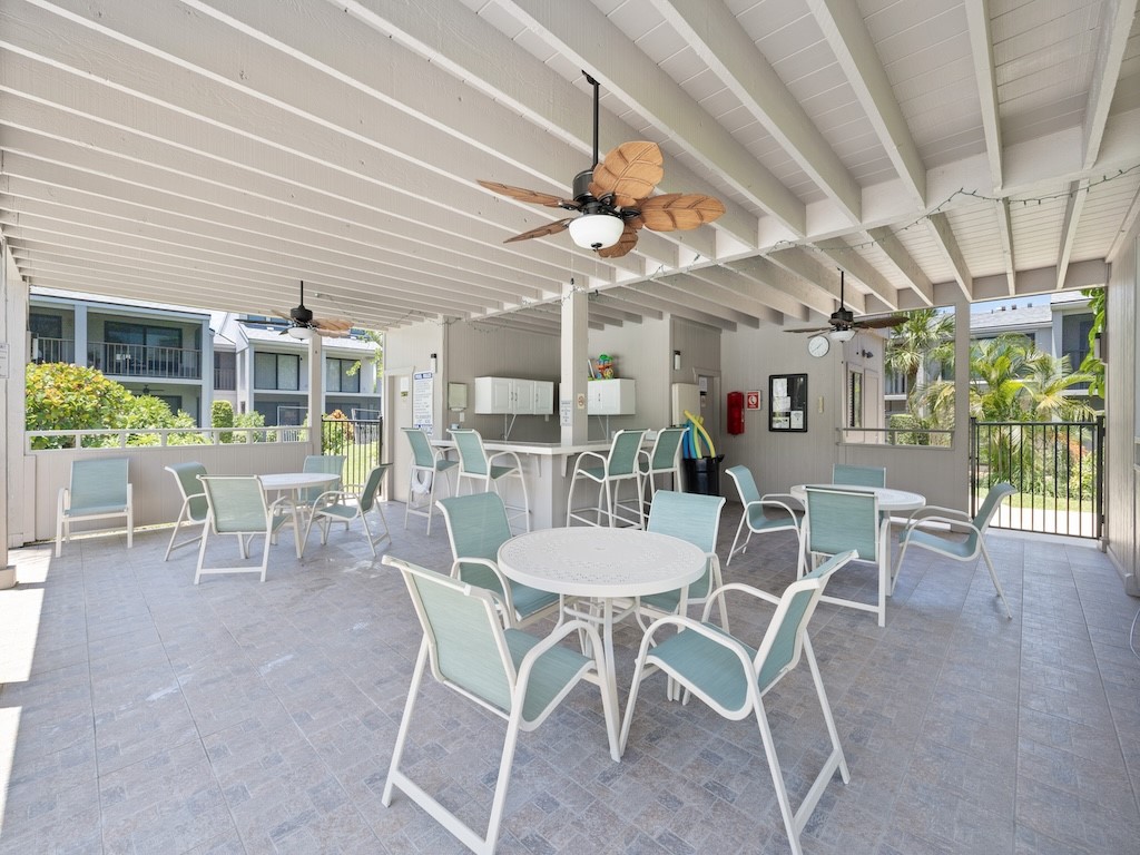 1155 Reef Road, Unit B7 Vero Beach, FL 32963 - Photo 5 of 31 a view of a dining room with furniture window and outside view