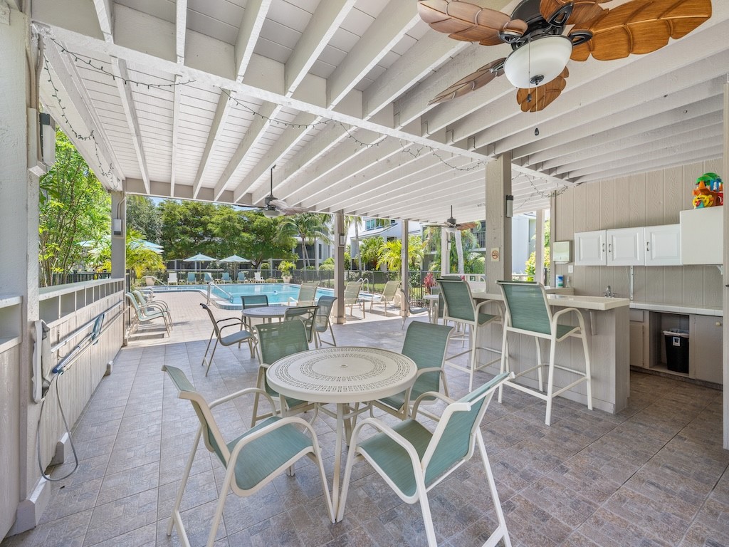 1155 Reef Road, Unit B7 Vero Beach, FL 32963 - Photo 6 of 31 a view of a dining room with furniture window and outside view