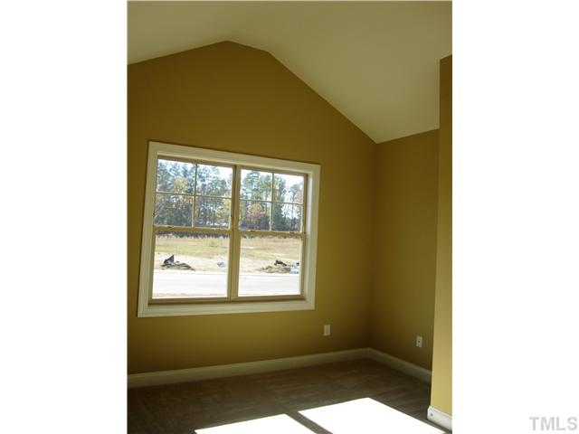 7639 Birchmoor Way, Unit LT91 Raleigh, NC 27616 - Photo 12 of 15 a bathroom with a window
