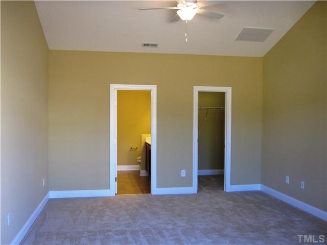 7639 Birchmoor Way, Unit LT91 Raleigh, NC 27616 - Photo 13 of 15 an empty room with a bathroom