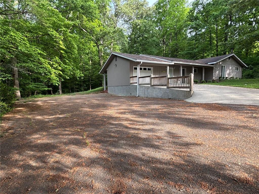 183 Barker Road Southwest Rome, GA 30165 - Photo 2 of 75 a front view of a house with a garden