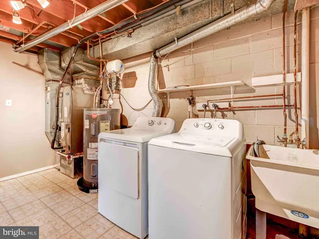 a view of a living room and bathroom