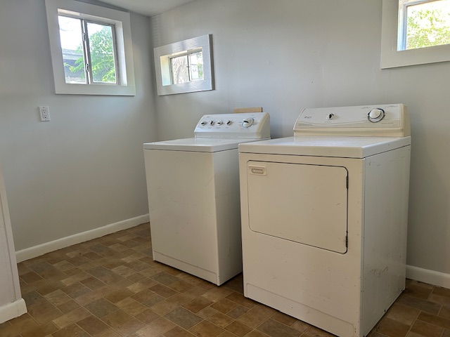 5513 Woodrow Avenue Austin, TX 78756 - Photo 16 of 17 a utility room with dryer and washer