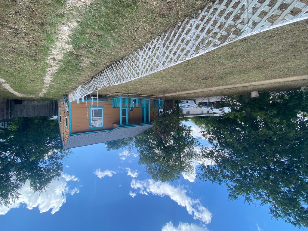 5513 Woodrow Avenue Austin, TX 78756 - Photo 2 of 17 a view of a house with a yard