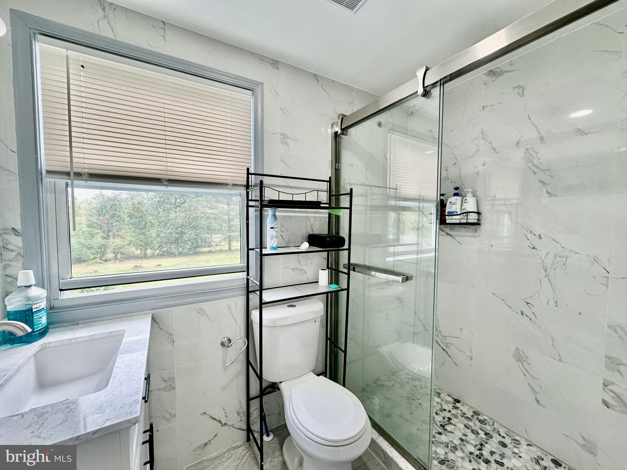 633 Durham Road Newtown, PA 18940 - Photo 21 of 31 a bathroom with a toilet and a shower