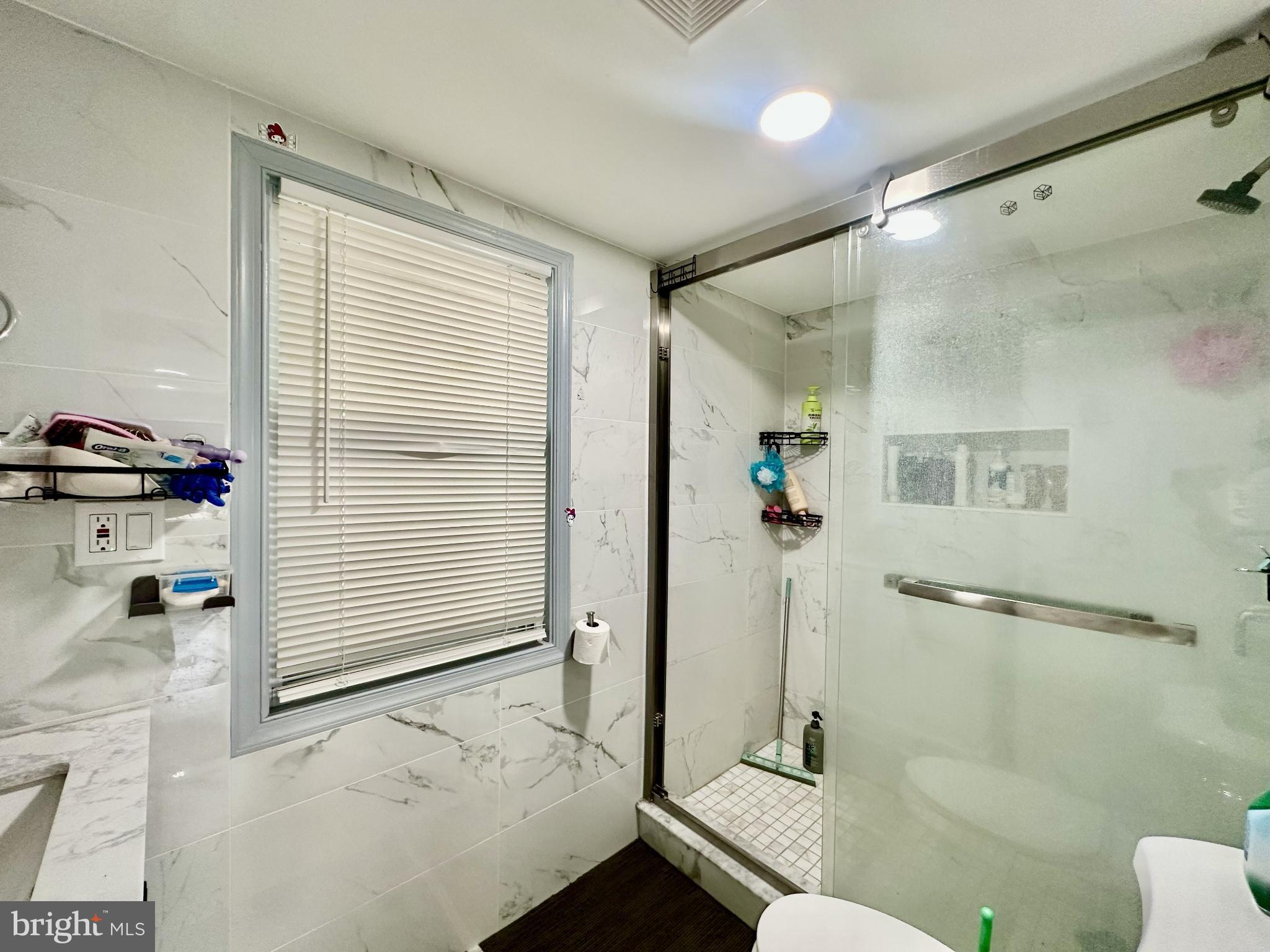 633 Durham Road Newtown, PA 18940 - Photo 23 of 31 a bathroom with a sink and a mirror