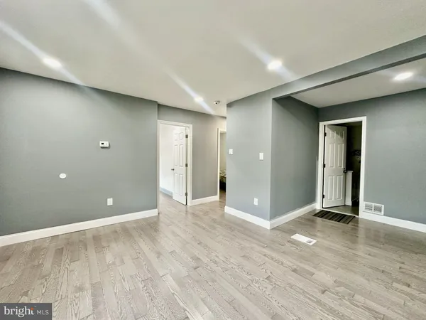 a view of livingroom with wooden floor