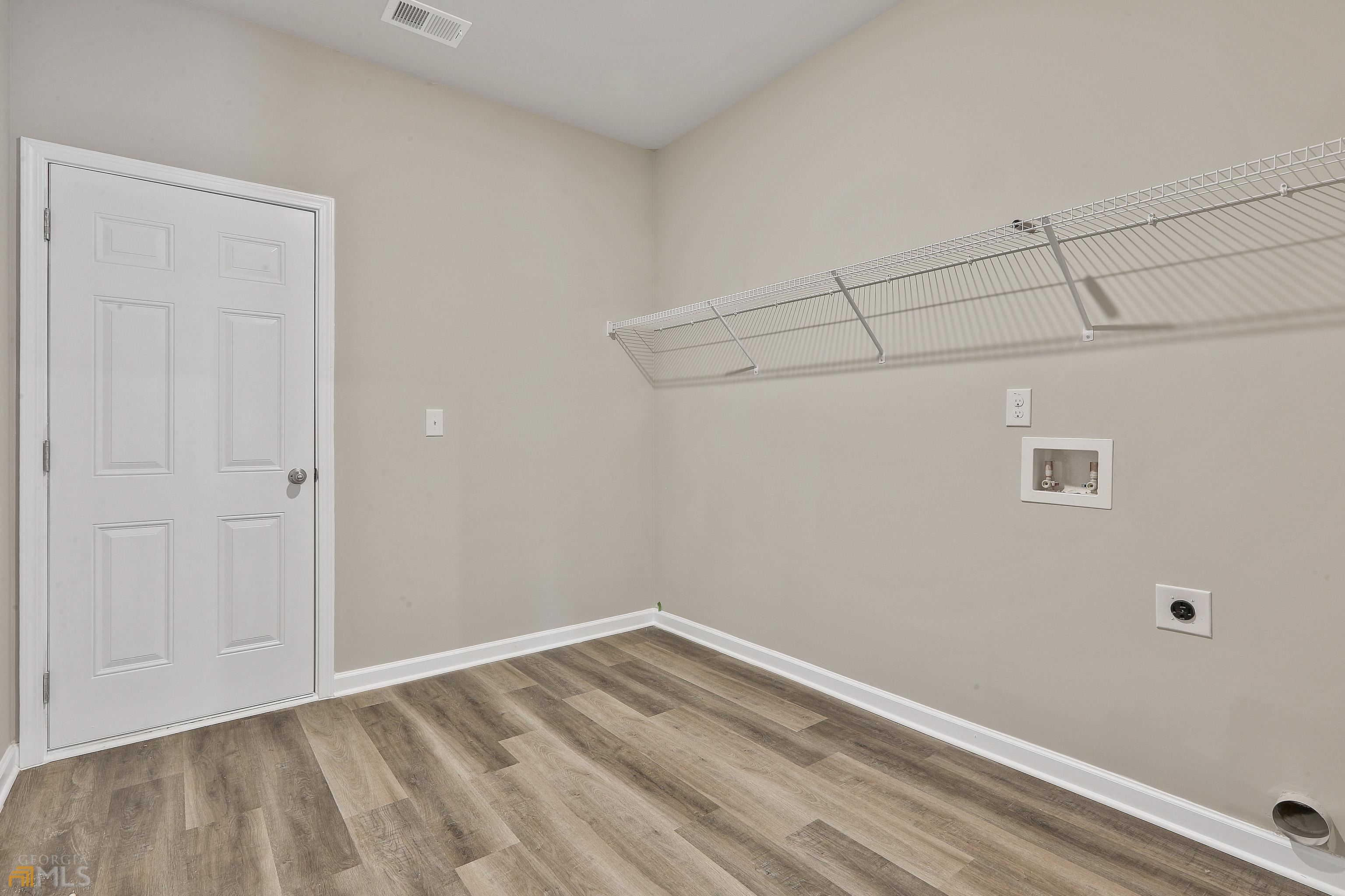 3575 Strickland Town Road Luthersville, GA 30251 - Photo 22 of 29 a view of a room with wooden floor