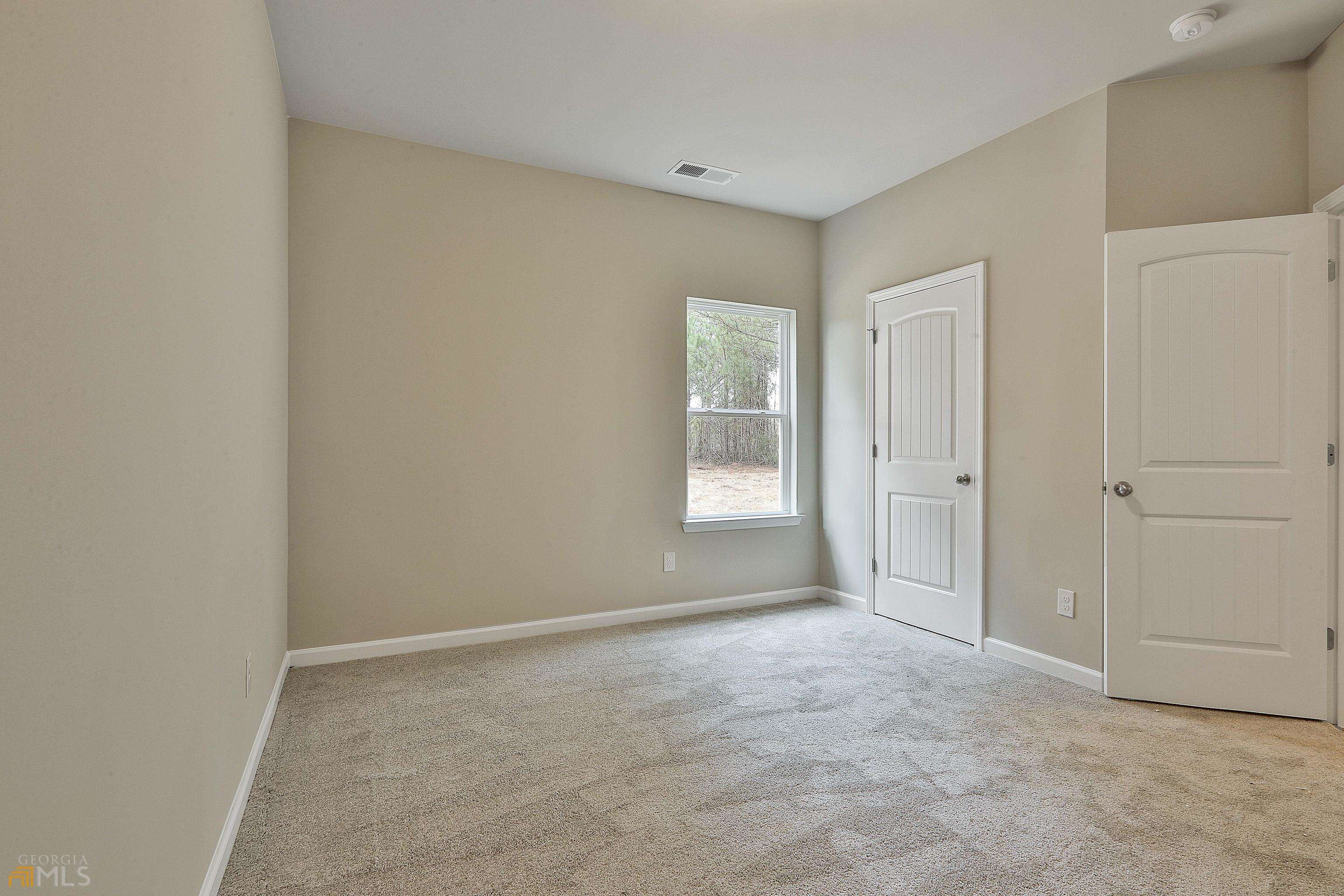3575 Strickland Town Road Luthersville, GA 30251 - Photo 25 of 29 a view of an empty room and window