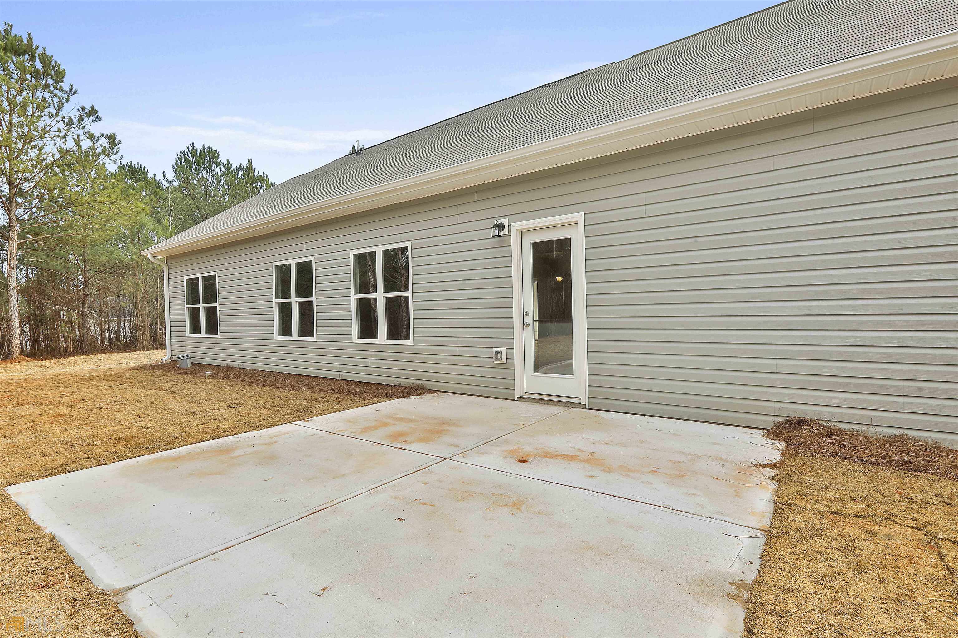 3575 Strickland Town Road Luthersville, GA 30251 - Photo 28 of 29 a backyard of a house