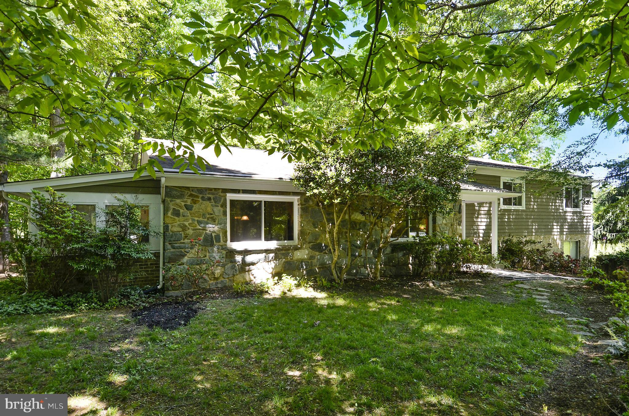 21013 Sunnyacres Road Gaithersburg, MD 20882 - Photo 2 of 30 a view of a house with backyard