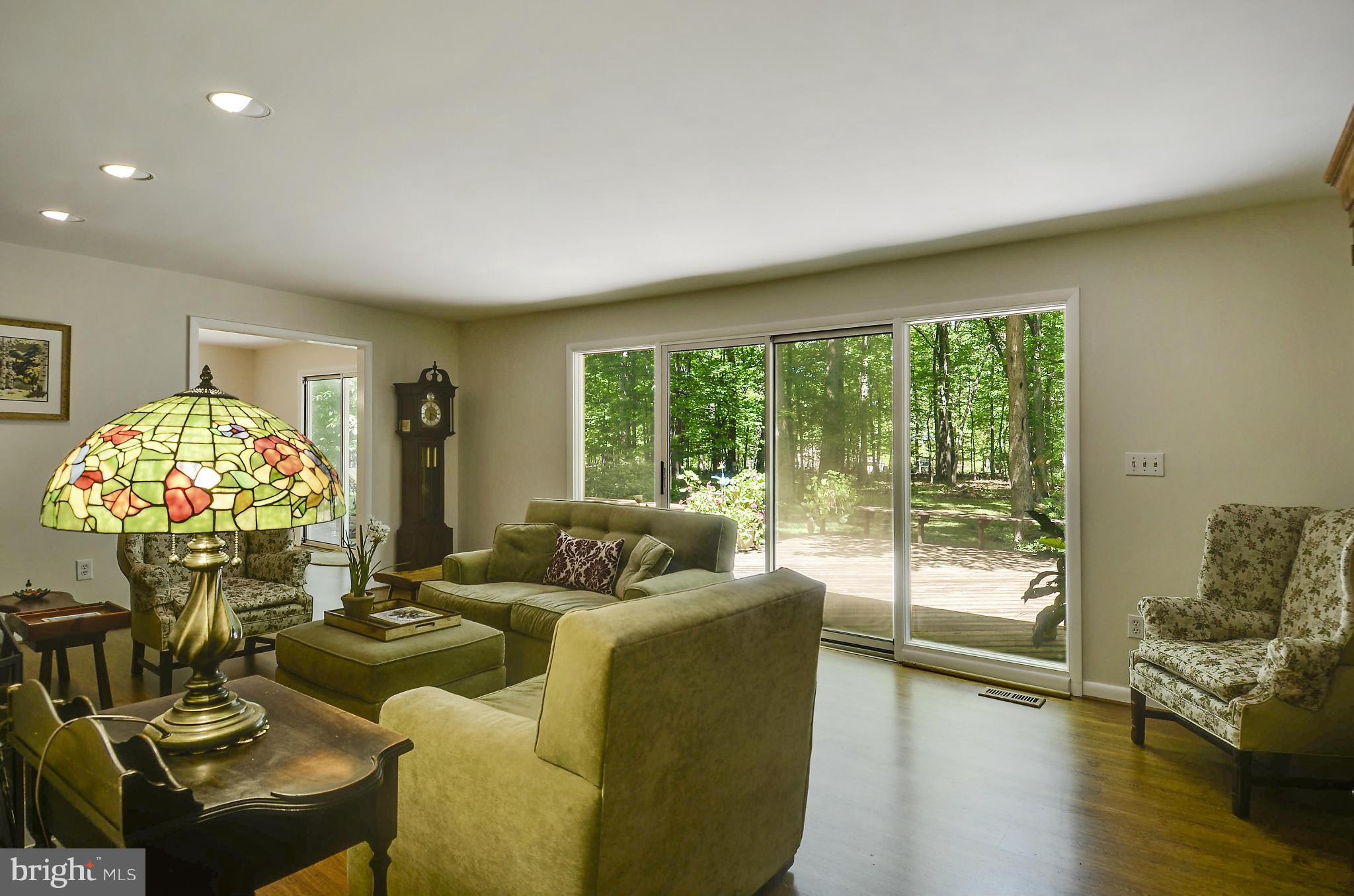 21013 Sunnyacres Road Gaithersburg, MD 20882 - Photo 17 of 30 a living room with furniture and a large window