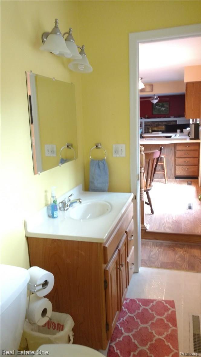 8337 Rondale Drive Grand Blanc, MI 48439 - Photo 11 of 21 CONVENIENT 1/2 BATH TO MASTER BEDROOM OR KITCHEN