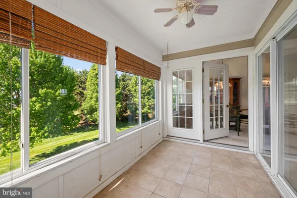 a view of a room with a large window
