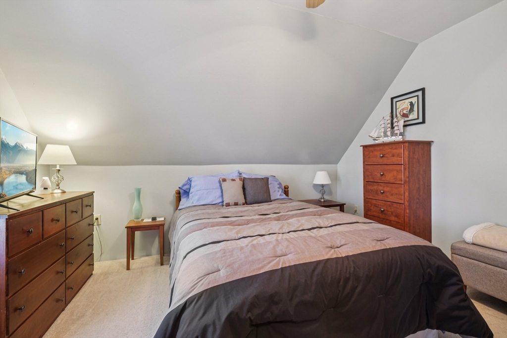 39-41 Kinsman Street Everett, MA 02149 - Photo 21 of 37 a bedroom with a bed and a dresser