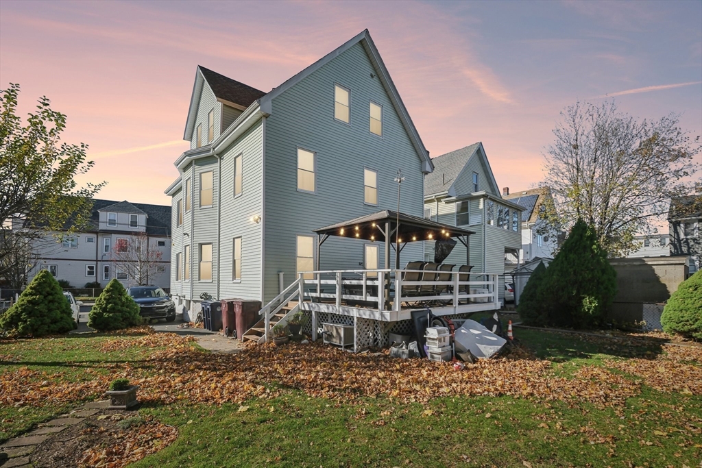 39-41 Kinsman Street Everett, MA 02149 - Photo 37 of 37 a front view of a house with a garden