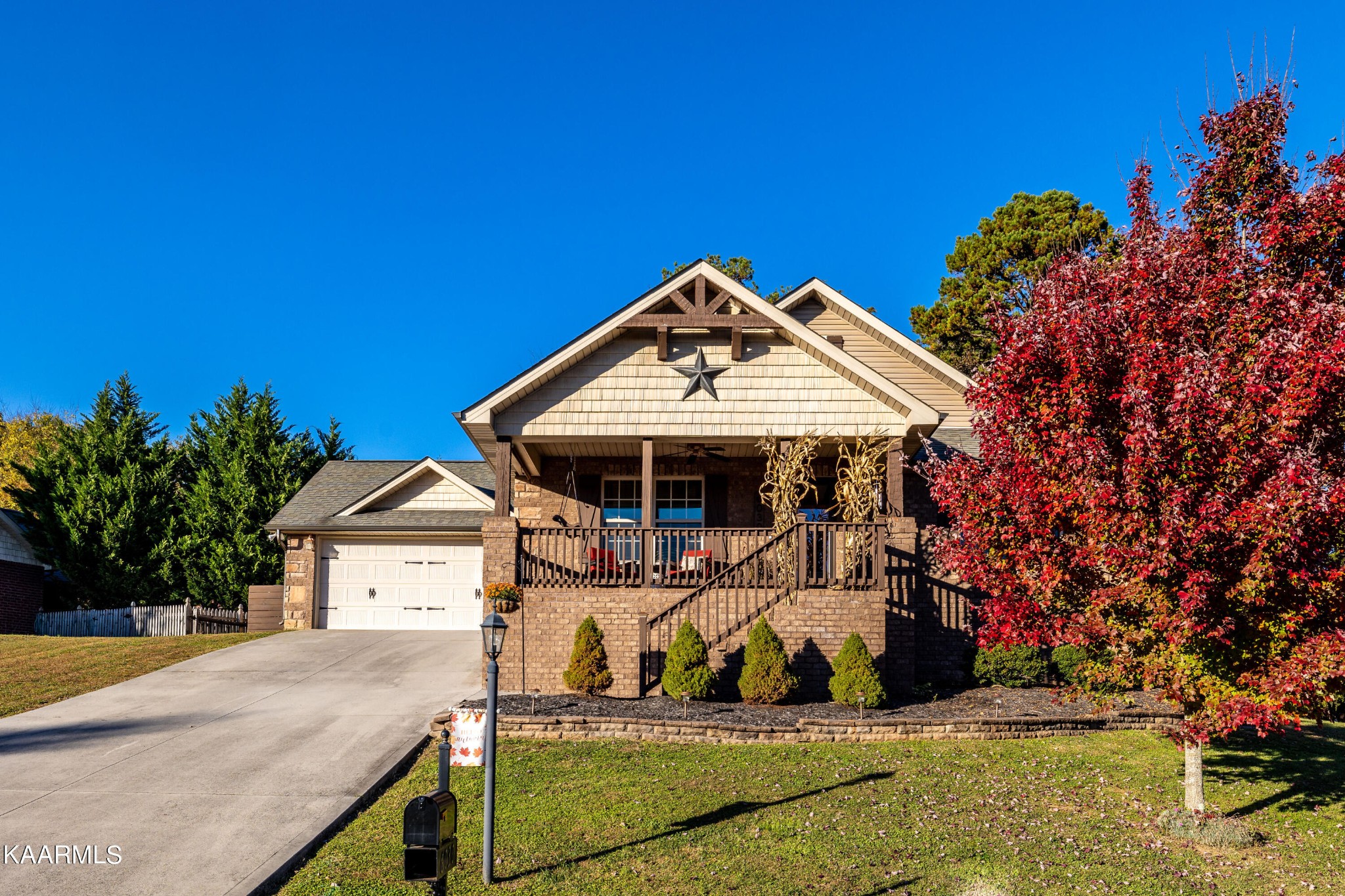 6030 Whisper Ridge Lane Corryton, TN 37721 - Photo 1 of 30 a front view of a house with a yard