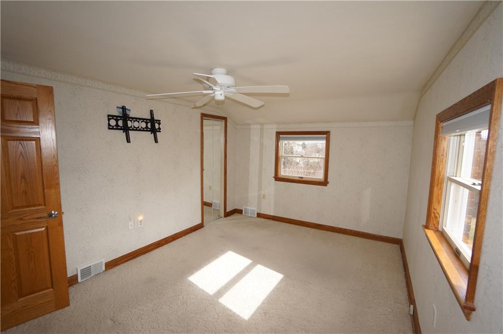 890 Middle Road Castle Shannon, PA 15234 - Photo 18 of 25 Master bedroom bright & full of sun...custom cordless blinds, ceiling fan & flat screen TV mounting hardware