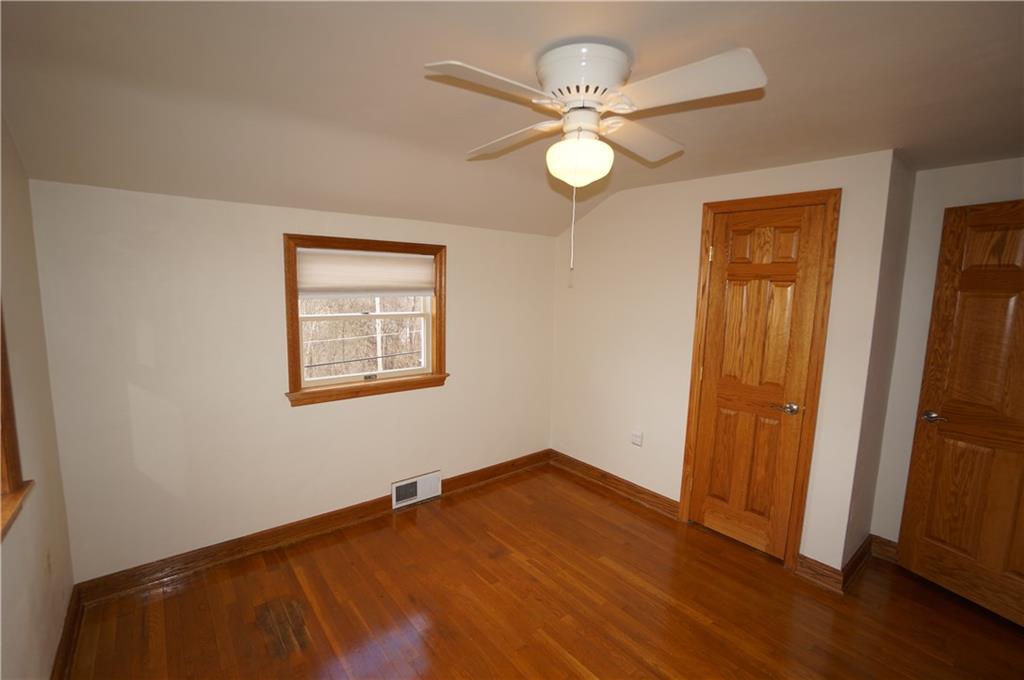 890 Middle Road Castle Shannon, PA 15234 - Photo 19 of 25 bedroom two has two windows w custom blinds, closet, overhead fan/light combo and OAK hardwood floors