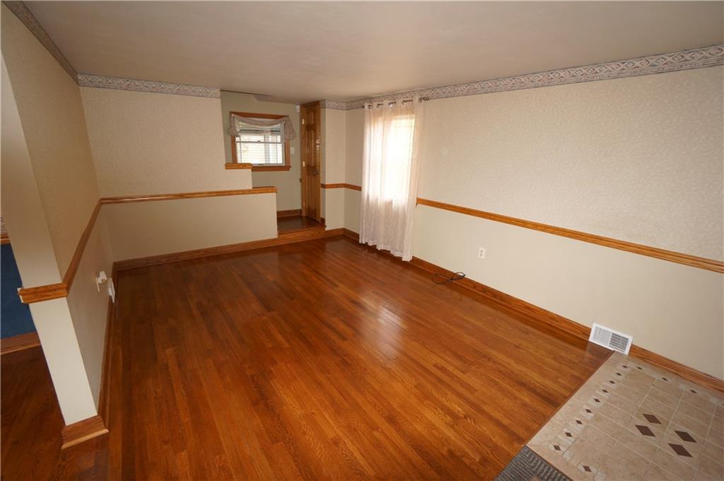890 Middle Road Castle Shannon, PA 15234 - Photo 3 of 25 Living room w its ceramic tile entry, REAL oak hardwood floors & matching OAK trim, chair rail & doors