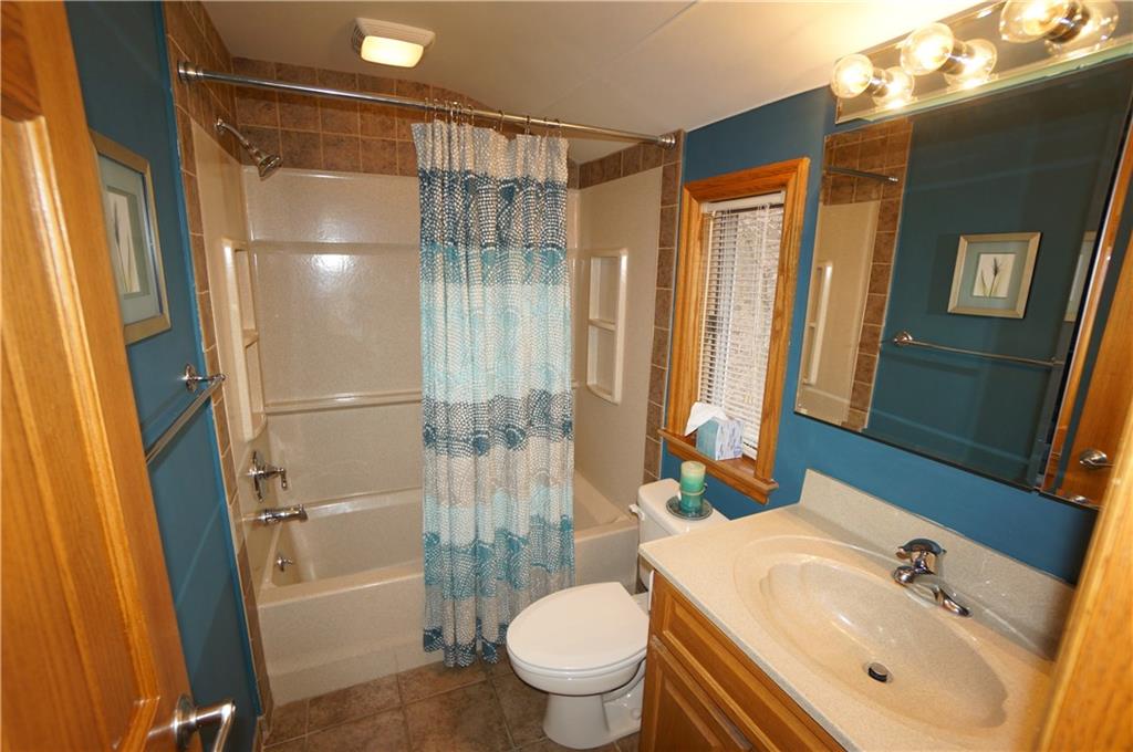 890 Middle Road Castle Shannon, PA 15234 - Photo 21 of 25 Second floor bath w ceramic floor, beautiful tub surround w tile accents, its just sooo clean & tasteful