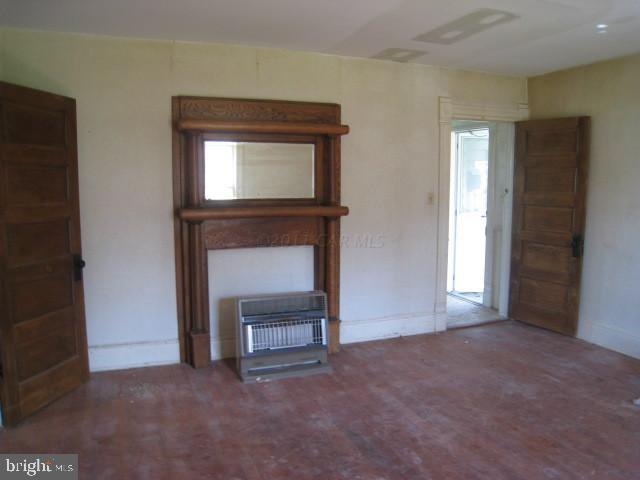 5905 Coventry Parish Road Westover, MD 21871 - Photo 7 of 9 a view of empty room with a fireplace