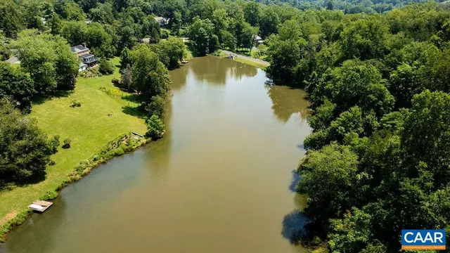 a view of a lake with a houses