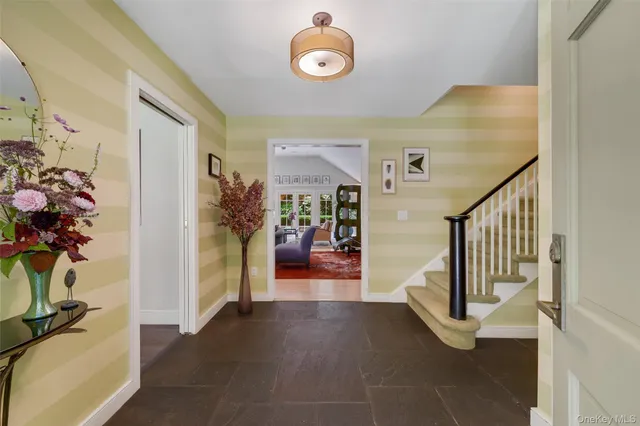a view of entryway with livingroom and furniture
