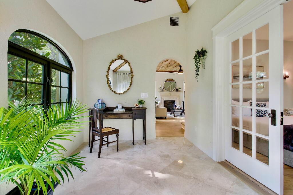 623 Avon Road West Palm Beach, FL 33401 - Photo 15 of 39 a living room with furniture a rug and a large window