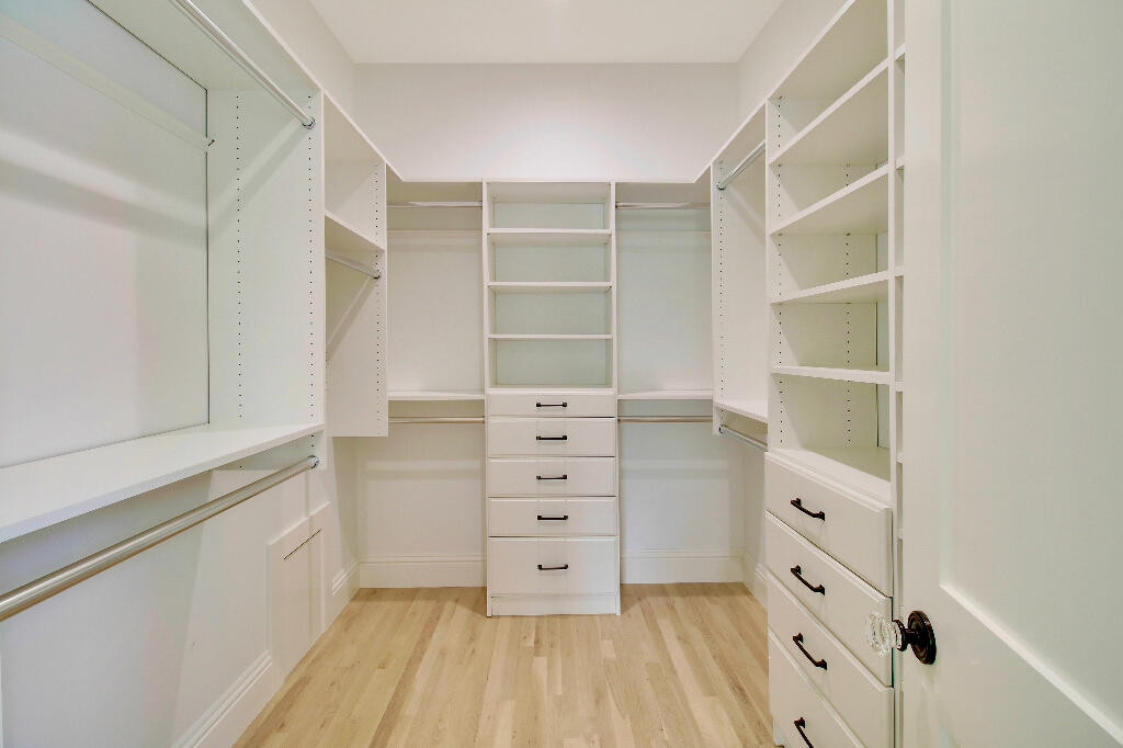 623 Avon Road West Palm Beach, FL 33401 - Photo 24 of 39 a view of an empty walk in closet