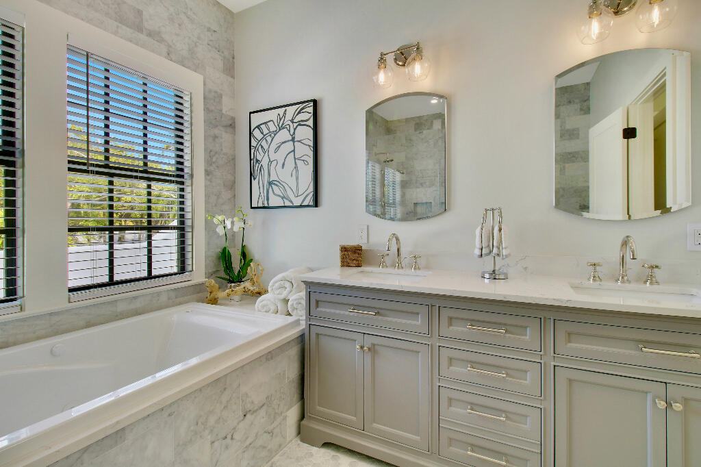623 Avon Road West Palm Beach, FL 33401 - Photo 27 of 39 a bath room with a sink and a bathtub