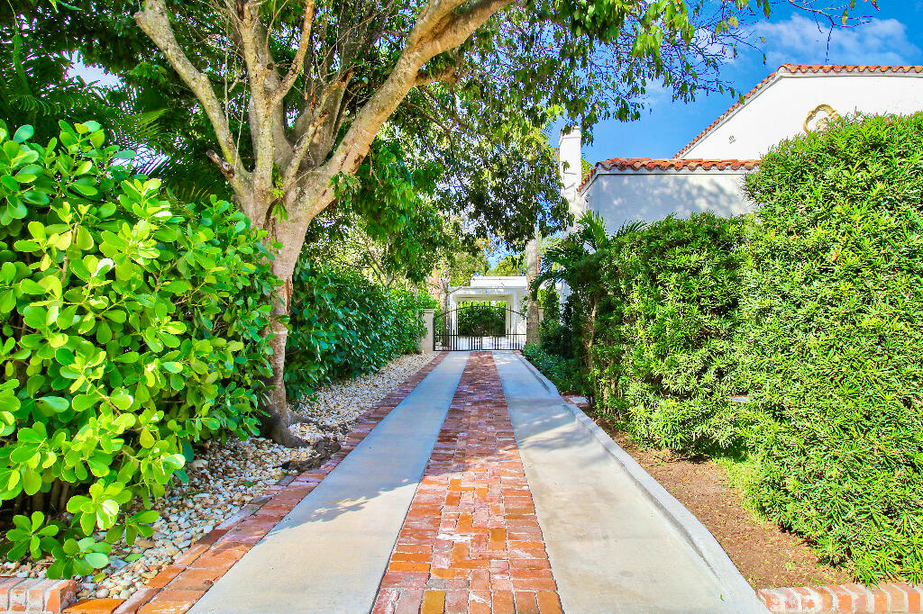 623 Avon Road West Palm Beach, FL 33401 - Photo 38 of 39 a view of a garden with pathway