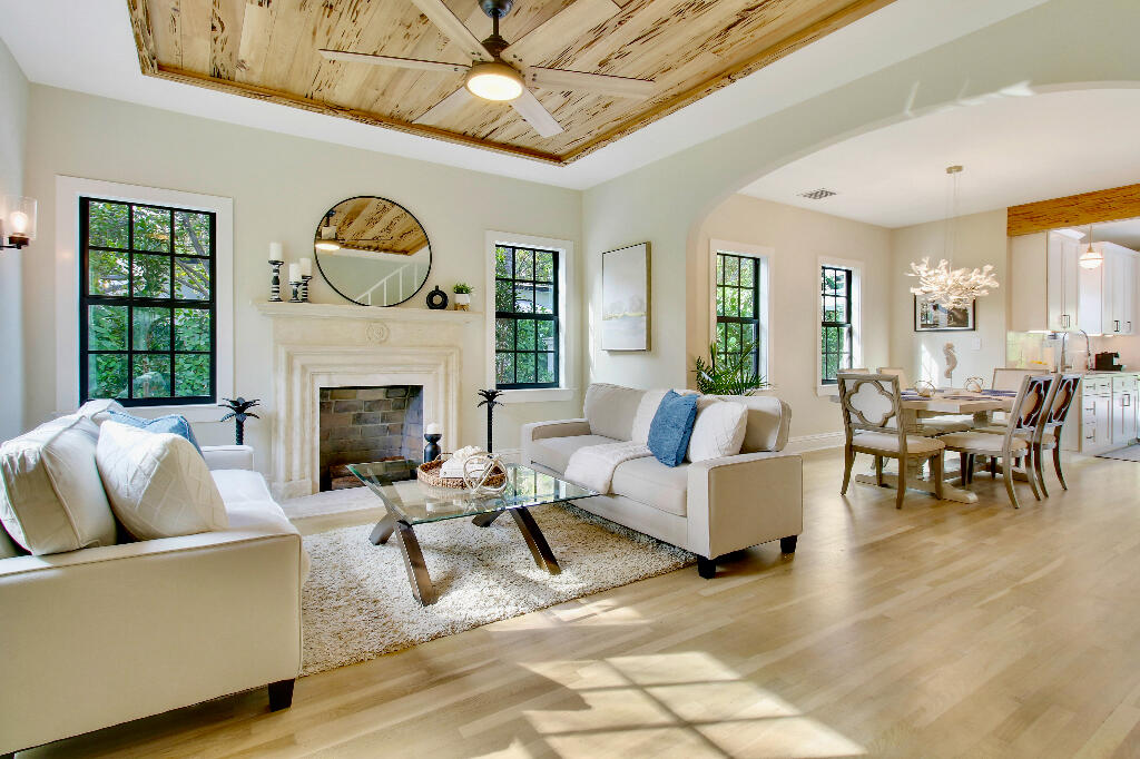 623 Avon Road West Palm Beach, FL 33401 - Photo 4 of 39 a living room with furniture and a fireplace