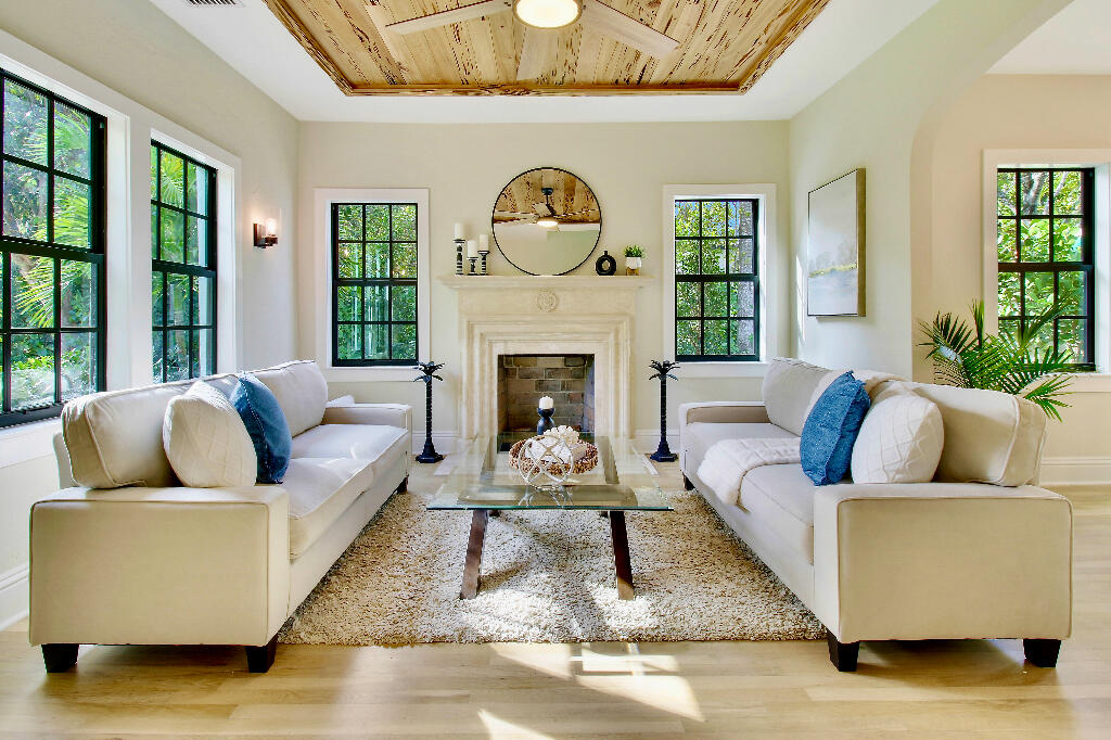 623 Avon Road West Palm Beach, FL 33401 - Photo 5 of 39 a living room with furniture and a fireplace