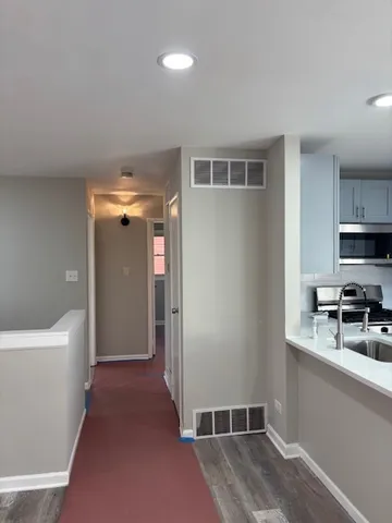 a view of an empty room and window