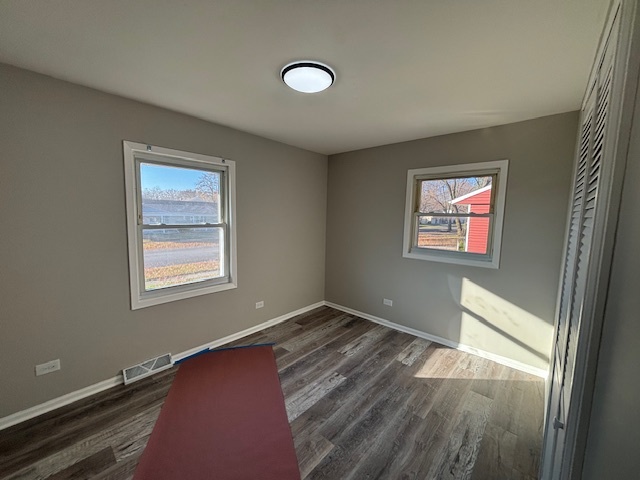 201 East Rose Street Glenwood, IL 60425 - Photo 22 of 49 a view of empty room with wooden floor and fan