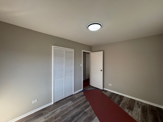 201 East Rose Street Glenwood, IL 60425 - Photo 23 of 49 an empty room with wooden floor