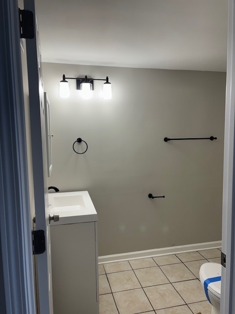 201 East Rose Street Glenwood, IL 60425 - Photo 24 of 49 a bathroom with a sink and toilet