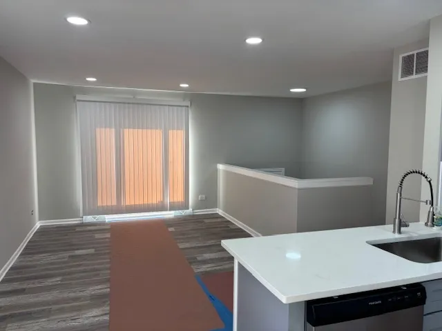 a bathroom with a sink and toilet