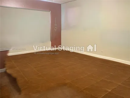 a view of a room with an empty space