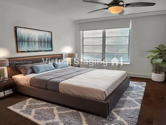 a bedroom with bed and window