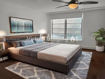 a bedroom with bed and window