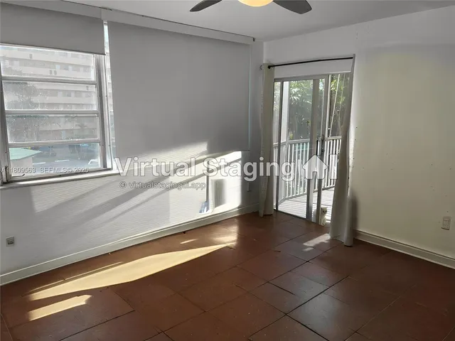a view of a kitchen with a sink and dishwasher