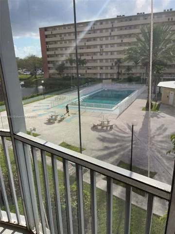 a view of a balcony with a ocean view