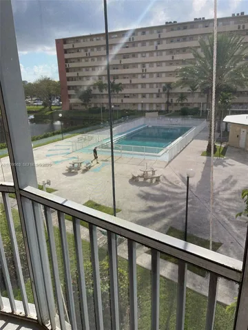 a view of a balcony with a ocean view