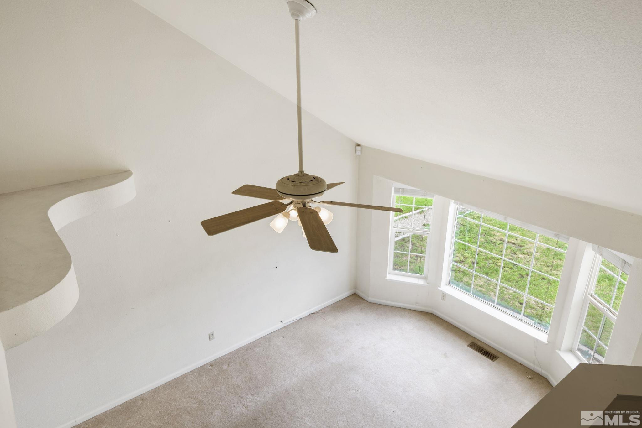 403 Aspen Drive Dayton, NV 89403 - Photo 19 of 36 a view of an empty room with a window